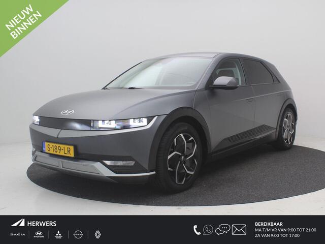 Hyundai IONIQ 5 Connect+ 77.4 kWh / SoH 100% / Trekhaak Afneembaar / 1600kg Trekgewicht / Stoel en Stuurverwarming / Elektrische Verstelbare Voorstoelen / HUD / 1ste Eigenaar / NL auto / Dealer onderhouden / Fabrieksgarantie tm 22-03-2028 /