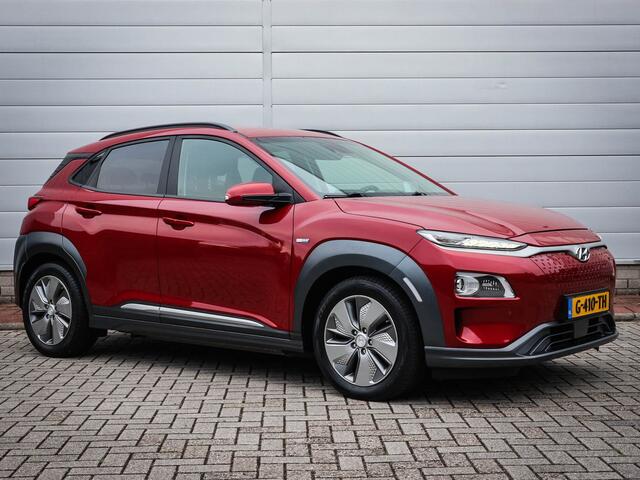 Hyundai Kona EV Premium 64 kWh | Clima | Cruise | Navi | Leer | Stoel/stuur verwarming | Pdc | Camera | Lichtmetaal