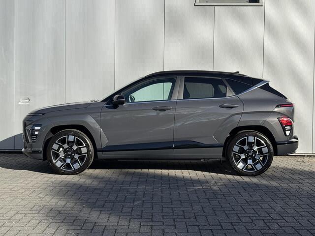 Hyundai Kona Electric Comfort Smart 65.4 kWh / Navigatie / 19" Lm velgen / Elektrisch bedienbare achterklep / Stoel en Stuur verwarming /