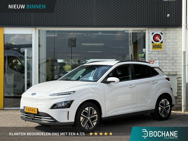 Hyundai Kona EV Fashion 64 kWh | NAP | 1E eigenaar | TREKHAAK | 98% SoH | Navigatie | Achteruitrijcamera | Head-up display | Climate Control | Warmtepomp | LED | DAB | Cruise Adaptief |