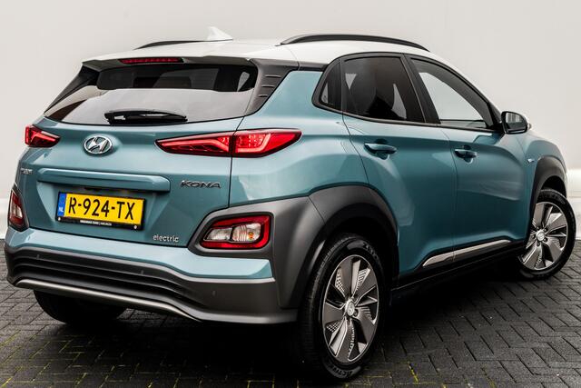 Hyundai Kona EV Premium 64 kWh RIJKLAAR INCL:GARANTIE AUTOMAAT | Two-Tone lak | Leer | Clima | Navigatie | PDC V/A | Stoel / stuur verwarming |