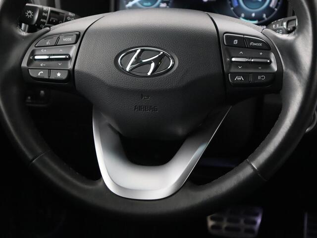 Hyundai Kona EV Fashion 64 kWh | Stoelverwarming | Head-Up | Camera | Carplay | Adaptive cruise | Navigatie | Keyless | Climate control