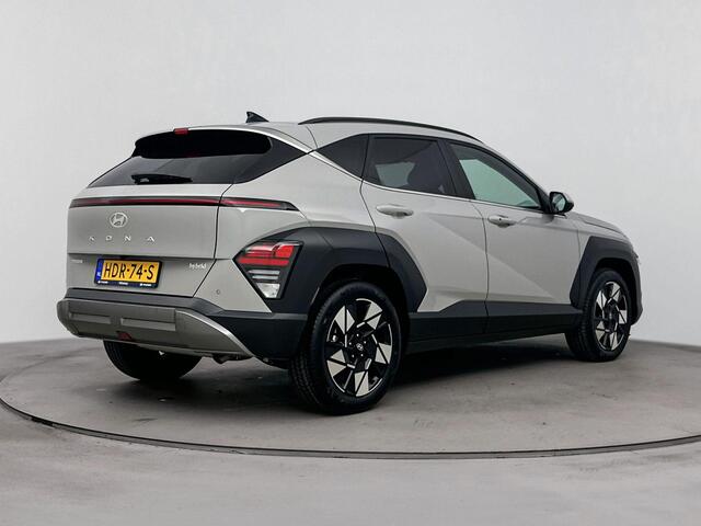 Hyundai Kona 1.6 GDI HEV Comfort Smart | Stoel en stuurwiel verwarming | Parkeer sensoren voor en achter | Navigatie en Apple Carplay Android Auto |