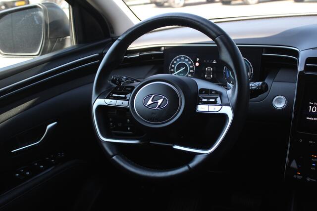 Hyundai TUCSON 1.6 T-GDI PHEV Comfort Smart 4WD | Incl 12 maanden garantie | Cruise control | Climate control | Schakelmogelijkheid aan het stuurwiel | Apple Carplay/Android Auto | DAB | Lichtmetalen velgen | Bluetooth | Voorstoelen verwarmd | Verwarmd Stuurwiel | Volle