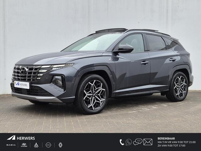 Hyundai TUCSON 1.6 T-GDI PHEV Plug-in N Line Sky 4WD Automaat / HUD / Glazen schuif- en kanteldak / Stuur- en Stoelverwarming / Stoelventilatie voor / Elektrische achterklep / Achterbank verwarming / Rondomzicht camera /