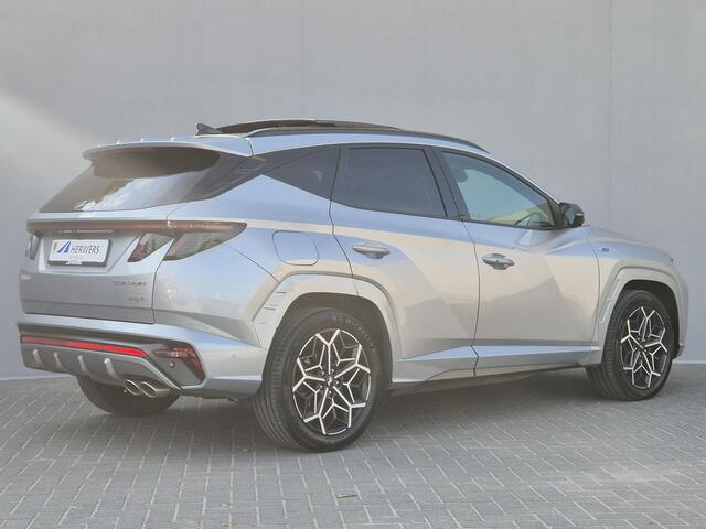 Hyundai TUCSON 1.6 T-GDI PHEV N Line Sky 4WD / Apple Carplay Android Auto / Stuur-, Stoel en Achterbankverwarming / Glazen schuif- en kanteldak / Trekgewicht 1350 kg / Rondomzicht camera / Adaptief CC / Krell Audio Systeem /