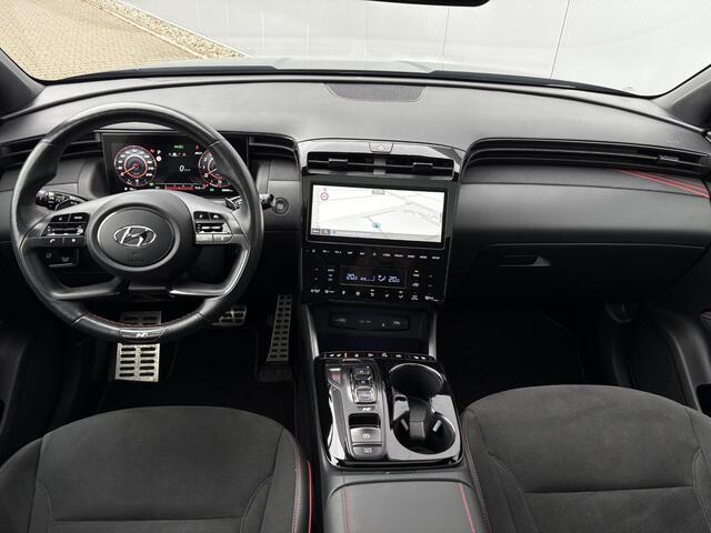 Hyundai TUCSON 1.6 T-GDI HEV N Line Sky / Trekhaak (1650kg) / Elektrisch glazen panorama-dak / Kunstlederen/suede bekleding / Stoelverwarming voor/achter / All-season banden /