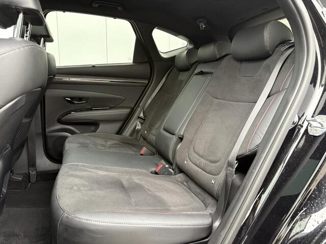 Hyundai TUCSON 1.6 T-GDI HEV N Line Sky / Trekhaak (1650kg) / Elektrisch glazen panorama-dak / Kunstlederen/suede bekleding / Stoelverwarming voor/achter / All-season banden /