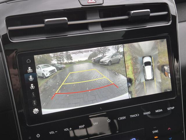Hyundai TUCSON 1.6 T-GDI PHEV Plug-in Premium Sky 4WD Automaat / elektrisch glazen panorama-dak / Trekgewicht 1350 kg / Stuur-, Stoel en Achterbank verwarming / Elektrische achterklep / Adaptief CC / Rondomzicht camera /
