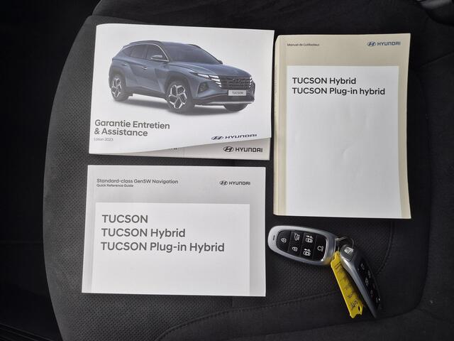 Hyundai TUCSON 1.6 T-GDI 230pk HEV N Line Sky Automaat / Fabrieksgarantie tot 04-2029 / 1600kg Trekgewicht / Panoramadak / Elektrische Stoelen met Memory / elektrisch glazen panorama-dak / Rondomzicht camera / Stuur-, Stoel en Achterbank verwarming /