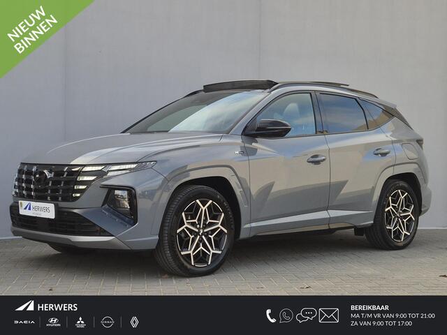 Hyundai TUCSON 1.6 T-GDI PHEV Plug-in N Line Sky 4WD Automaat / Fabrieksgarantie tot 10-2027 / Trekgewicht 1350 kg / Glazen schuif- en kanteldak / EAER bereik 62 km bereik stad 74 km / Elektrische achterklep / Stuur-, Stoel en Achterbank verwarming /