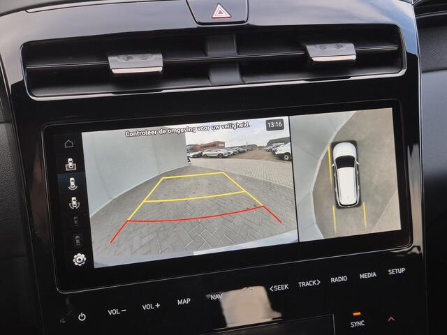 Hyundai TUCSON 1.6 T-GDI PHEV Plug-in N Line Sky 4WD Automaat / Fabrieksgarantie tot 10-2027 / Trekgewicht 1350 kg / Glazen schuif- en kanteldak / EAER bereik 62 km bereik stad 74 km / Elektrische achterklep / Stuur-, Stoel en Achterbank verwarming /