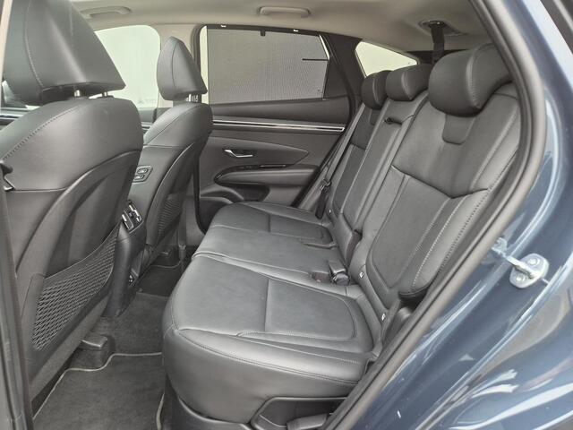 Hyundai TUCSON 1.6 T-GDI HEV Premium Sky Automaat / Fabrieksgarantie tot 03-2029 / Dealer onderhouden / Adaptief cruise control / Glazen schuif- en kanteldak / Elektrische achterklep / Stuur-, Stoel en Achterbank verwarming / Rondomzicht camera / Adaptief CC /