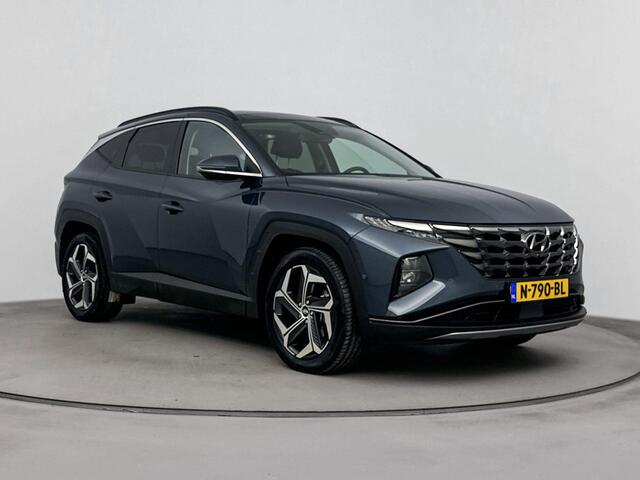 Hyundai TUCSON 1.6 T-GDI HEV Premium Sky | Elektrisch glazen Panorama-dak | Trekhaak 1.650 kg trekgewicht | Navigatie | Stoel verwarming en ventilatie |