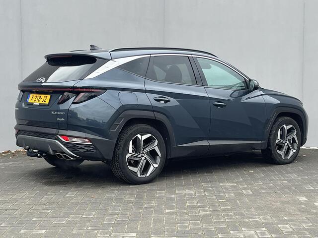 Hyundai TUCSON 1.6 T-GDI PHEV Comfort Smart 4WD / Vaste Trekhaak 13-polig (Trekgewicht 1.350kg) / Achteruitrijcamera / Stuur- en Stoelverwarming / Climate Control / Adaptieve Cruise Control / Apple Carplay & Android Auto / Keyless Entry & Start / Navigatie full map / E