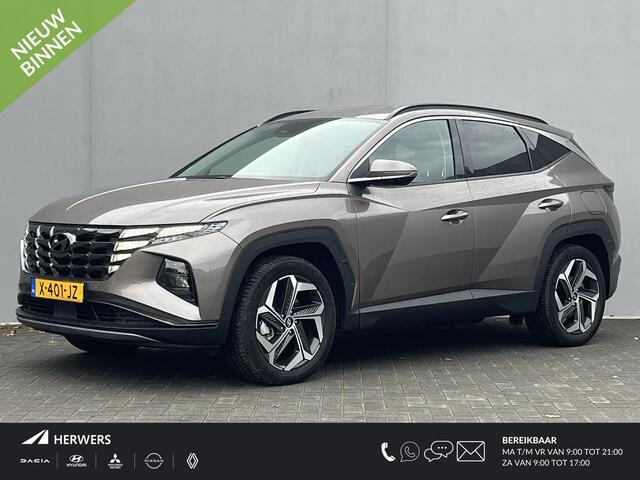 Hyundai TUCSON 1.6 T-GDI PHEV Comfort Smart 4WD / Vaste Trekhaak 13-polig (Trekgewicht 1.350kg) / Achteruitrijcamera / Stuur- en Stoelverwarming / Climate Control / Adaptieve Cruise Control / Apple Carplay & Android Auto / Keyless Entry & Start / Navigatie full map / E