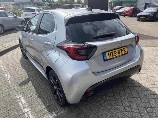 Mazda 2 Hybrid 1.5 Homura , Demovoordeel ¤ 3.000,-, Automaat, Apple Carplay, Clima, Adap.Cruise, LMV 17 Inch, Camera, PDC, Stuur/Stoelverwarming