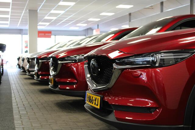 Mazda 3 2.0 e-SkyActiv-X M Hybrid 186 Nagisa Demovoordeel ¤ 5.000,-, Bruin Leder, Bose, Navi, Adap.Cruise, Clima, Apple Carplay, Camera, PDC, HUD, Stoelverwarming, 18" LMV