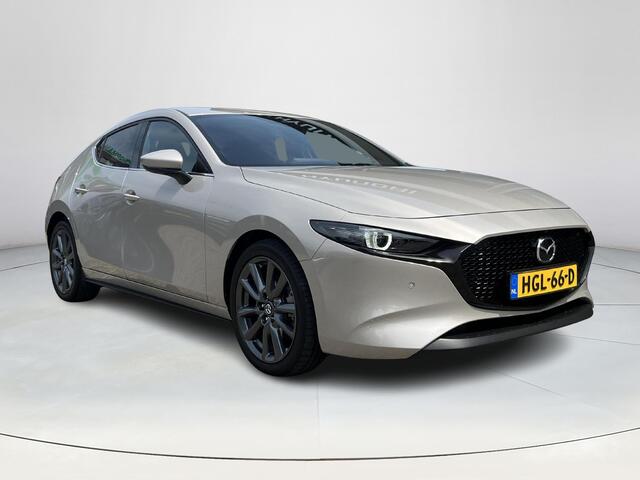 Mazda 3 2.5 e-SkyActiv-G M Hybrid 140 Takumi | Bose | Automaat | Elektrische verstelbare stoelen met stoelgeheugen | Stoel/stuurverwarming | 360 graden camera | Apple Carplay/Android Auto | Privacy glass | Leder |
