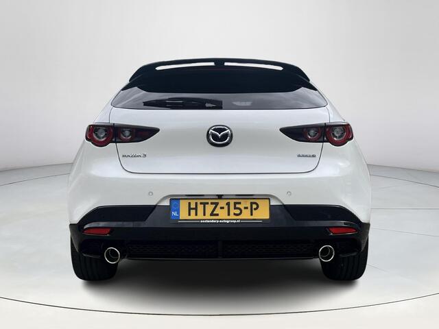 Mazda 3 2.0 e-SkyActiv-X M Hybrid 186 Nagisa | Aero pakket | Alcantara/Leder met stoelgeheugen | Achteruitrijcamera | Bose | HeadupDisplay | Navigatie en draadloze Applecarplay\Androidauto | Verlichte Dorpelbeschermers | Parelmoer Wit