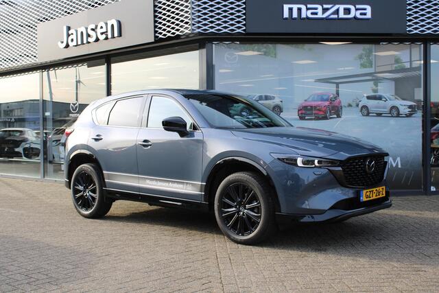 Mazda CX-5 2.0 e-SkyActiv-G M Hybrid 165 Homura , Demovoordeel ¤ 6.390-, Navi, Adap.Cruise, Clima, Leder, Apple Carplay, 360 Camera, PDC, HUD, Stoelverwarming/ventilatie, 19" LMV, Elek.Achterklep