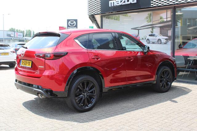 Mazda CX-5 2.0 SkyActiv-G 165 Homura , Automaat, Half Leder, 360 Camera, Adap. Cruise, Navi, LKA, Elektrische klep, Apple Carplay, HUD, Stoelverwarming, Stuurverwarming, Clima, LMV 19 Inch