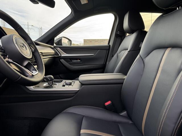 Mazda CX-60 2.5 e-SkyActiv PHEV Homura Business Edition | Stoelverwarming/verkoeling | Adaptive cruisecontrol | Lederen bekleding | Elektrische stoelen met geheugenfunctie | Stuurwiel elektrisch verstelbaar |360* camera | Elektronische achterklep |