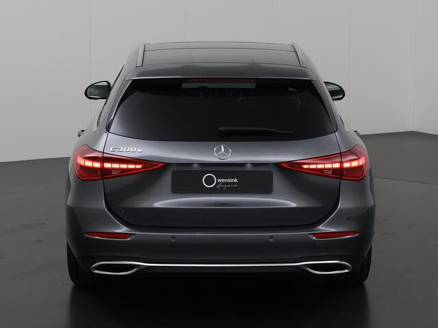 Mercedes-Benz C-KLASSE Estate 300e Star Edition | Achteruitrijcamera | Panoramaschuifdak | Sfeerverlichting | Stoelverwarming | Easypack-achterklep |