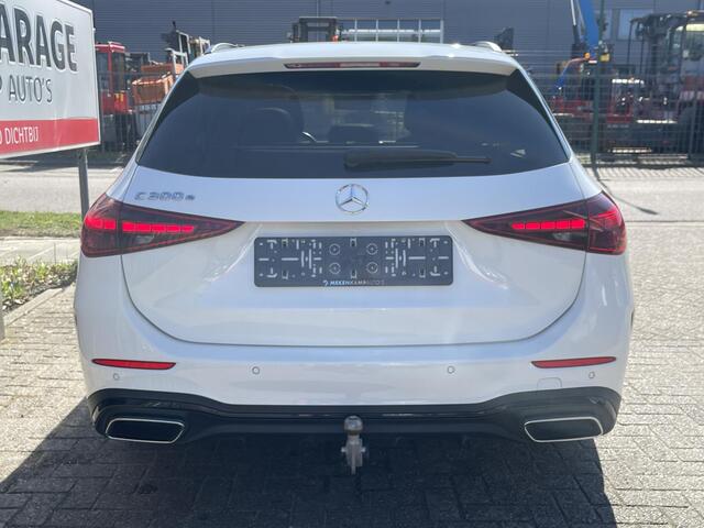 Mercedes-Benz C-KLASSE Estate 300 e AMG Line 18"/Panoramadak/Laser LED/Trekhaak/Stoelverwarming +memoryAdaptieve cruise/Sfeerverlichting premium/Elektrische klep/Apple Carplay & Android Auto