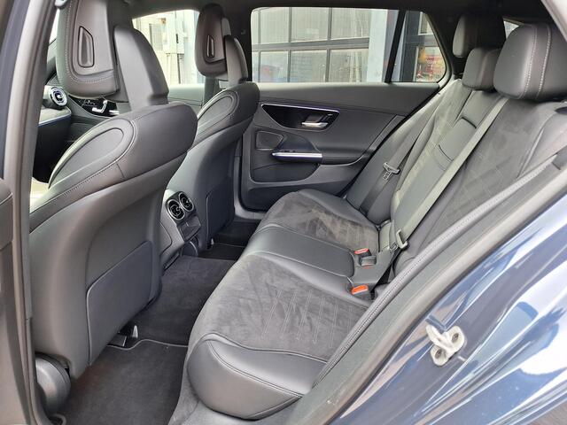 Mercedes-Benz C-KLASSE Estate 180 Star Edition AMG | Night Pakket | Trekhaak | Elektrisch Verstelbare Stoelen + Memory | Elektrische Achterklep | Apple CarPlay | Android Auto | Dodehoekassistent | Sfeerverlichting | Stoelverwarming | Achteruitrijcamera