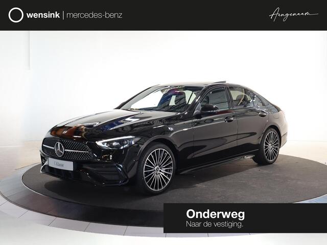 Mercedes-Benz C-KLASSE 300e Business Solution AMG | Panoramaschuifdak | Nightpakket | Digital Light | 19" LM velgen | Dodehoekassistent | 360° camera | Stoelverwarming | Sfeerverlichting |