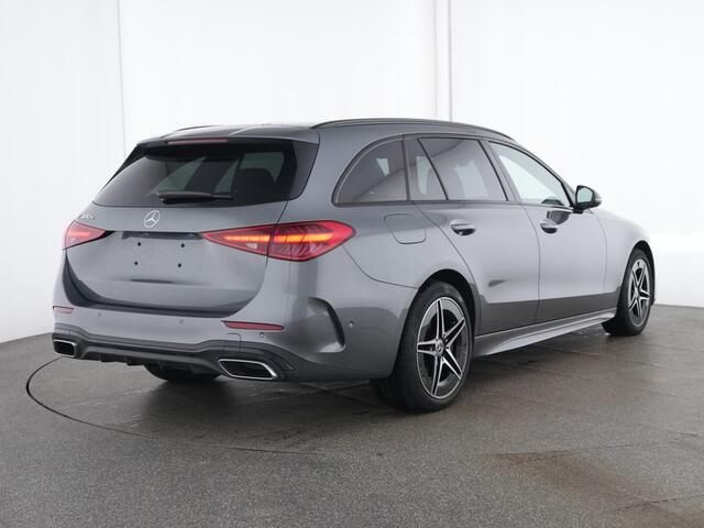 Mercedes-Benz C-KLASSE Estate 300 e AMG Plug-In Hybride AMG Line | Night Pakket | Trekhaak | Panorama Schuif-Kanteldak | Memory Voorstoelen. Inclusief 24 maanden Mercedes-Benz Certified garantie voor Europa.