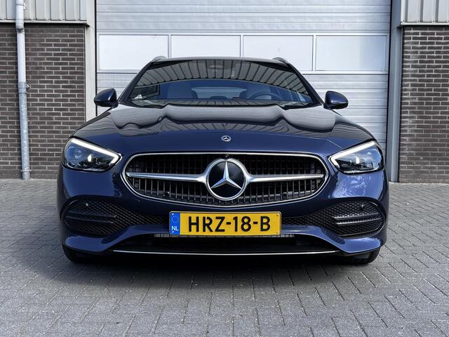 Mercedes-Benz C-KLASSE Estate 300 e Luxury Line | Leder Beige | Panoramadak | Winter Pakket | Trekhaak | DIGITAL LIGHT | DISTRONIC Afstandsassistent | 360° Camera | Stuurverwarming | Apple CarPlay | Android Auto | Elektrisch Verstelbare Stoelen + Memory
