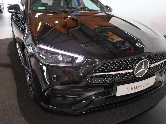 Mercedes-Benz C-KLASSE 300e Business Solution AMG | Panoramaschuifdak | Comfort plus | DIGITAL light | Night | 360 camera | Trekhaak