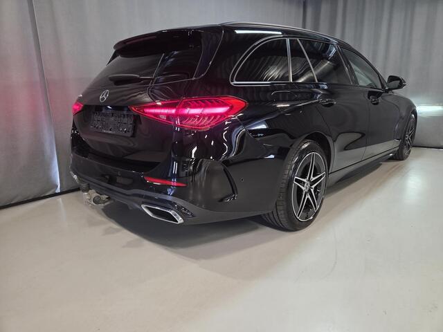 Mercedes-Benz C-KLASSE Estate 300 e AMG Line 18"/Trekhaak/Adaptieve cruise/LED/Stoelverwarming/Camera/Elektrische klep/Dodehoek/Sfeerverlichting