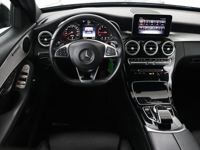 Mercedes-Benz C-KLASSE 200 AMG Night | Leder | Stoelverwarming | Full LED | Park Assist | Navigatie | Climate control | Cruise control | Bluetooth