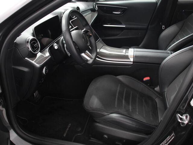 Mercedes-Benz C-KLASSE Estate 200 AMG Line | Climate control | Achteruitrijcamera | Wegklapbare trekhaak | Navigatie | Dodehoek assistent | LED | Sfeerverlichting | Adaptieve cruise control | Verwarmde voorstoelen | Elektrische kofferbak