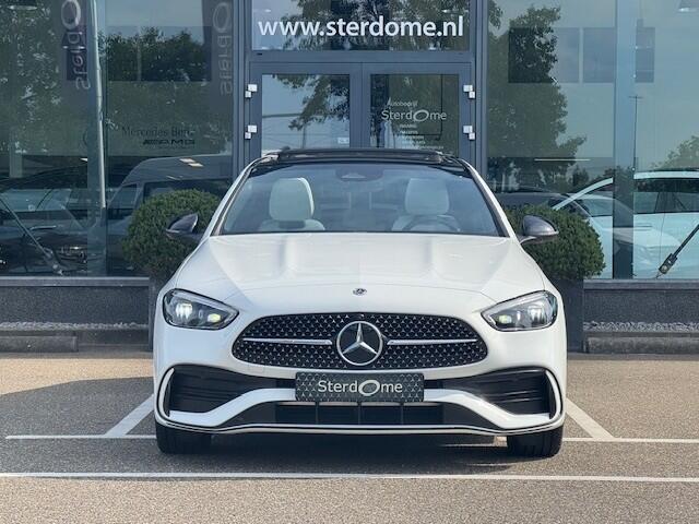 Mercedes-Benz C-KLASSE 300 e AMG Line I Panorama dak I Distronic + I 360° camera I Burmester I Head-up I Digital Light I Memory I Sfeerverlichting I I Stoelverwarming I Comfort onderstel I Thermotronic I MBUX I Keyless GO l