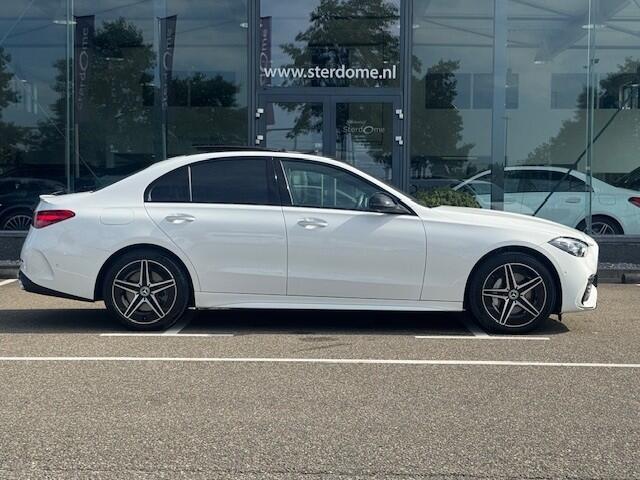 Mercedes-Benz C-KLASSE 300 e AMG Line I Panorama dak I Distronic + I 360° camera I Burmester I Head-up I Digital Light I Memory I Sfeerverlichting I I Stoelverwarming I Comfort onderstel I Thermotronic I MBUX I Keyless GO l