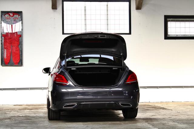 Mercedes-Benz C-KLASSE 180 Business Solution AMG | Panoramadak | Apple Carplay | Sfeerverlichting | AMG gril | NL auto |