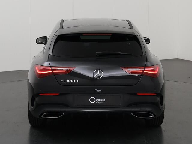Mercedes-Benz CLA-KLASSE Shooting Brake 180 Business Solution AMG | Night Pakket | Panoramadak | 19" multispaaks velgen | 360 graden camera | Elekt. inklapbare trekhaak |