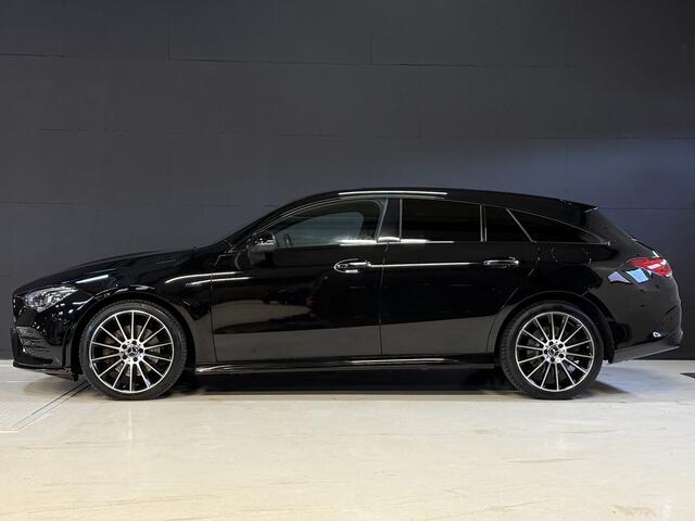 Mercedes-Benz CLA-KLASSE Shooting Brake 250 e AMG | Pano | Sfeerverlichting | Burmester | 360 Camera | Adaptive cruise | Elektr. stoelen + memory | Stoelverwarming | Full LED