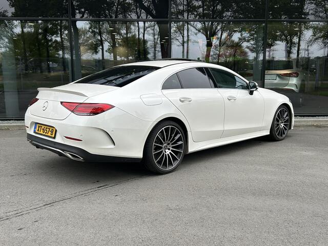 Mercedes-Benz CLS-KLASSE 450 4Matic AMG // Burmester // 360 Camera // Sunroof // Trekhaak // 20 inch // Designo White // Distronic