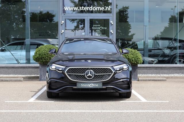Mercedes-Benz E-KLASSE 300 e AMG Line l Panoramadak l 360 Camera l Head-up l DISTRONIC l Burmester 4 D l Digital Light l Keyless Go l I MBUX l Night pakket I Memory stoelen I zomer + winter set I Essenhout I Augmented Reality I Stoelverwarming l