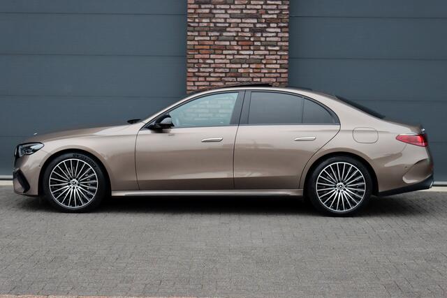 Mercedes-Benz E-KLASSE 300 e AMG Line | Hyperscreen | Airmatic | Achterasbesturing | Distronic+ | Stoelventilatie | Memory | Burmester | HUD | Digital Light | Surround Camera | Verwarmd Stuurwiel |