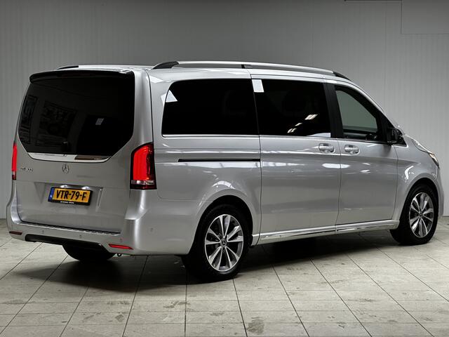 Mercedes-Benz EQV 300 L2 90kWh/ AMG Styling/ 2x Schuifdeur/ LED Koplampen/ 18'' LMV/ Vol Leder/ Elek. Kofferklep/ 360° Camera/ Sfeerverl./ Lane-Assist./ Apple + Android/ Elek. Stoelen + Memory/ Stoelverw.