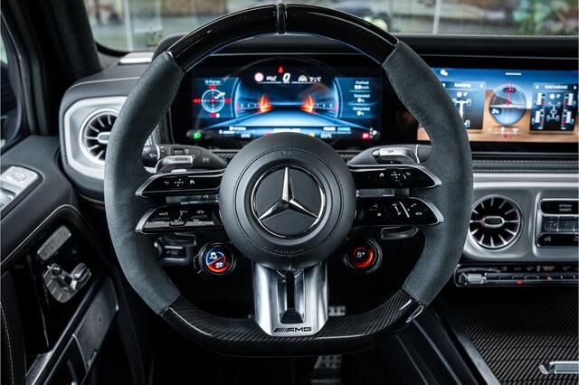 Mercedes-Benz G-KLASSE AMG 63 ** Akrapovic ** AMG Performance Pack ** Carbon ** Xpell PPF Face-lift MY25 ** Grijs kenteken (excl. btw) ** Target Blue Eye