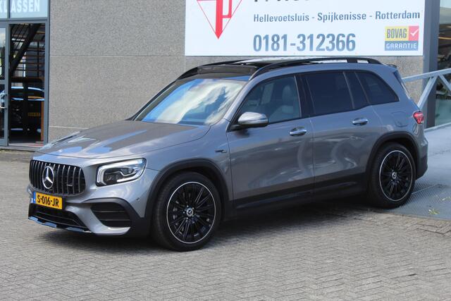 Mercedes-Benz GLB-Klasse AMG 35 4MATIC Premium Plus Panoramadak/Night pakket/Sfeerverlichting/Navigatie/Keyless/Cruise control/Climate control/Elektrisch verstelbare stoelen met memory/Stoelverwarming/Dodehoek detectie/Achteruitrijcamera/Parkeersensoren rondom/Elektrische achterk