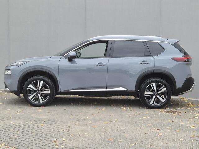 Nissan X-TRAIL 1.5 MHEV 163pk Tekna Automaat / HUD / Trekgewicht 2000 Kg / Elektrische achterklep / Apple Carplay Android Auto / Stuur-, Stoel en Achterbankverwarming / Adaptief CC / Rondomzicht camera / Voorruit verwarming /