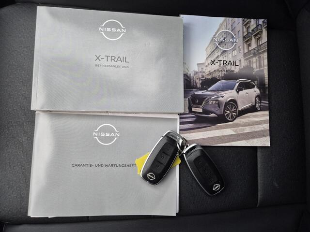 Nissan X-TRAIL 1.5 MHEV 163pk Tekna Automaat / Fabrieksgarantie tot 07-2027 / Dealer onderhouden / Allseason banden / Trekgewicht 2000 kg / HUD / Elektrische achterklep / Stuur-, Stoel en Achterbank verwarming / Rondomzicht camera /
